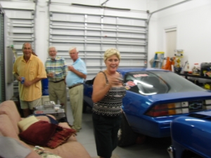 Sally inspecting Joe's garage